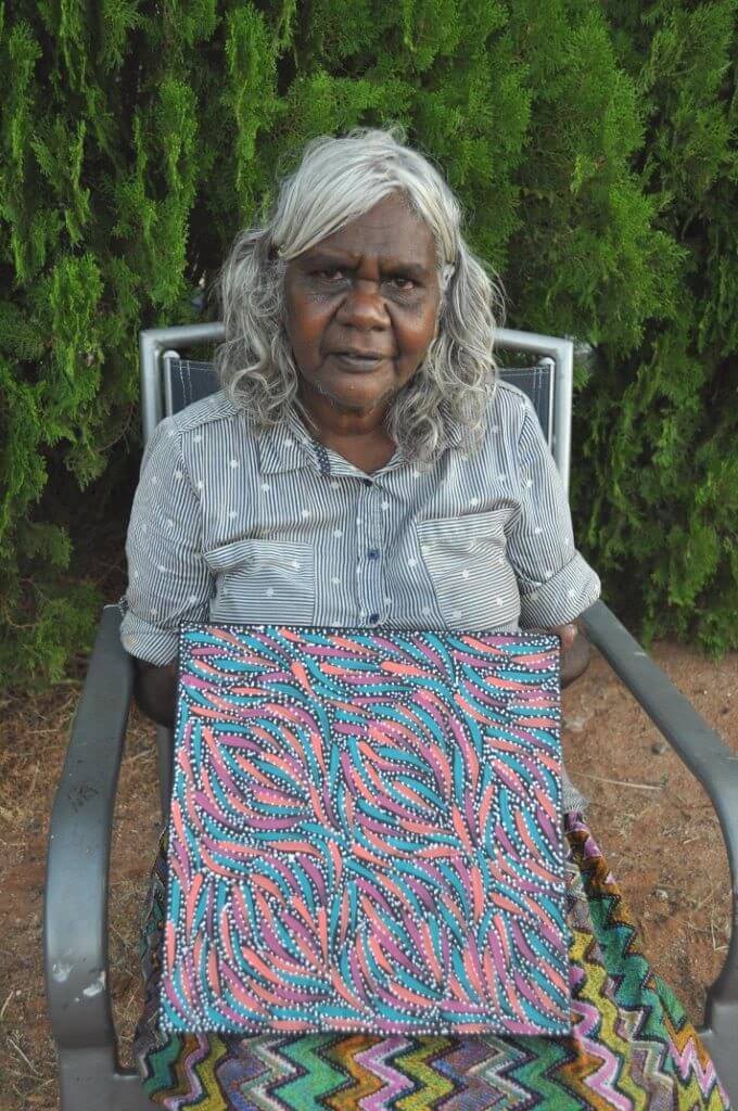 Rosemary was one of a group of Anmatyerre women at the forefront of the art movement in the Utopia area. She was amongst a small group of women who travelled to Indonesia to learn various techniques in the manufacturing of batiks. It was after the “summer project” sponsored by the CAAMA network in 1998 that Rosemary spread her wings and started painting with acrylics and canvas. As a bush woman, she is familiar with her land and its abundance of bush tucker species, medicine plants and native fauna. The stories related to the bush tucker have been inherited by her, along with important women’s stories and form the basis of her paintings. She is a highly talented artist whose works are sought after by collectors worldwide. Selected Collections • Holmes a’ Court Collection, Perth Selected Exhibitions 1989 • Utopia Women’s Paintings ‘A Summer Project’ 1990 • ‘A Picture Story’, 88 silk works from the Holmes a’Court Collection, UK 1993 • Central Australian Aboriginal Art & Craft Exhibition, Alice Springs 1996 • "The Meeting Place", - touring exhibition, Australia • "Nangara", Stitching Sint-Jan, Brugge, The Netherlands 1998 • Dacou Gallery, Australia 2008 • Black & White: Inspired by Landscapes, Kate Owen Gallery, Sydney • Central Art Christmas Exhibition, Alice Springs 2009 • Central Art Mid Year Exhibition, Alice Springs