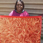Dulcie Long Pula holding Bush Leaves